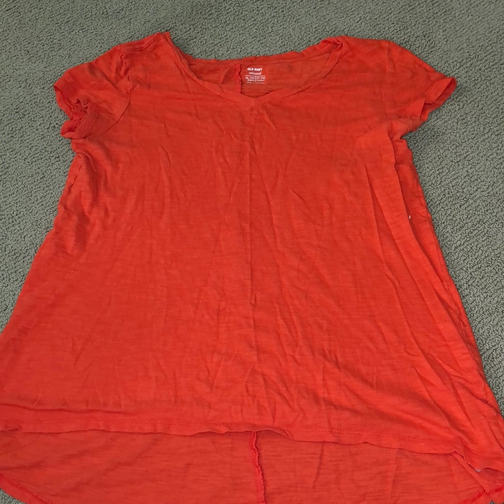 orange/ salmon color shirt
